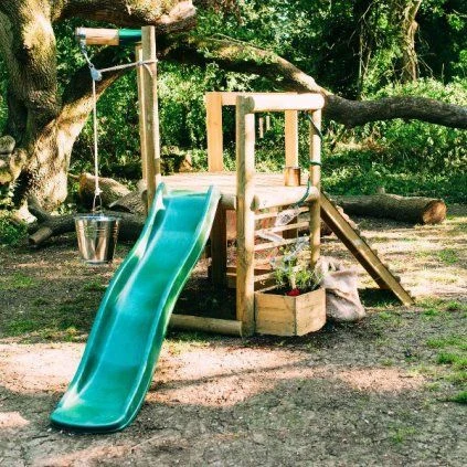 Wooden playset with slide