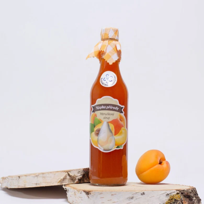 Apricot syrup bottle with fruit